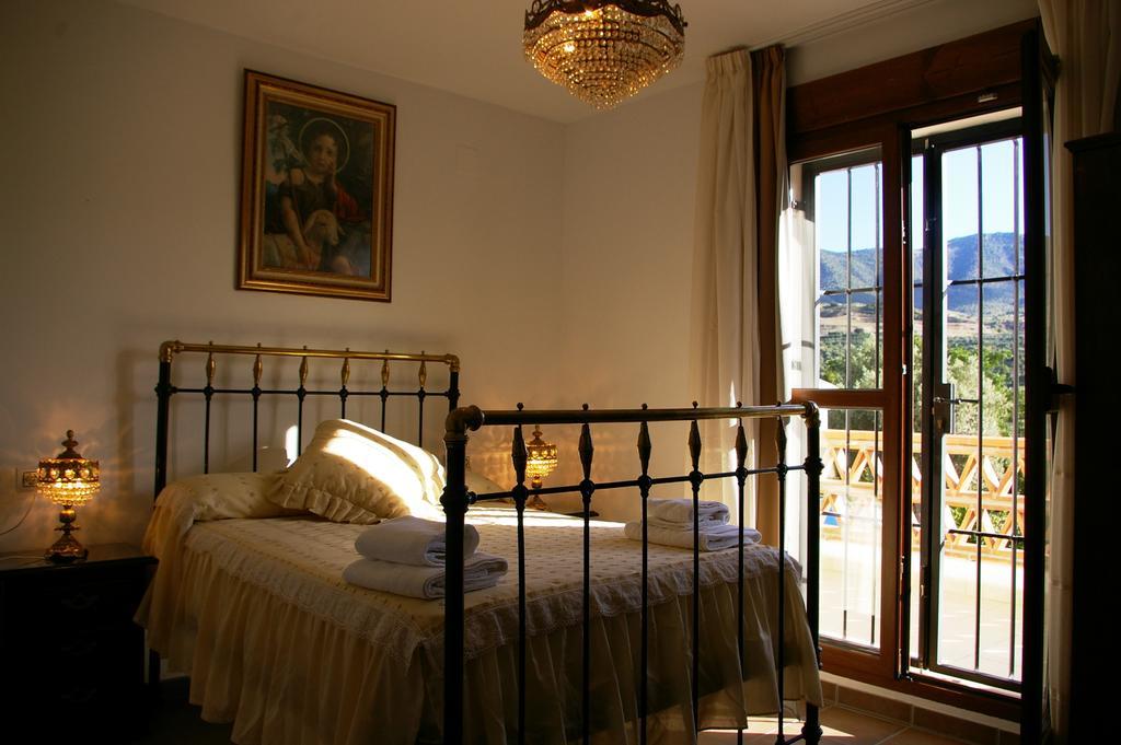 Hostal Y Apartamento Rural Los Naranjos Melegis ภายนอก รูปภาพ